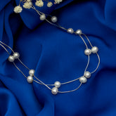 Silver Serenity: Pearl Adorned Necklace