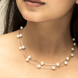 Silver Serenity: Pearl Adorned Necklace