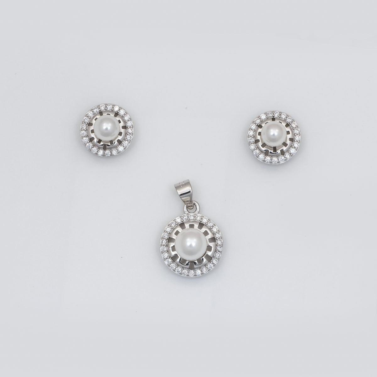 Elegance in Silver: Pearl Pendant and Earring Set