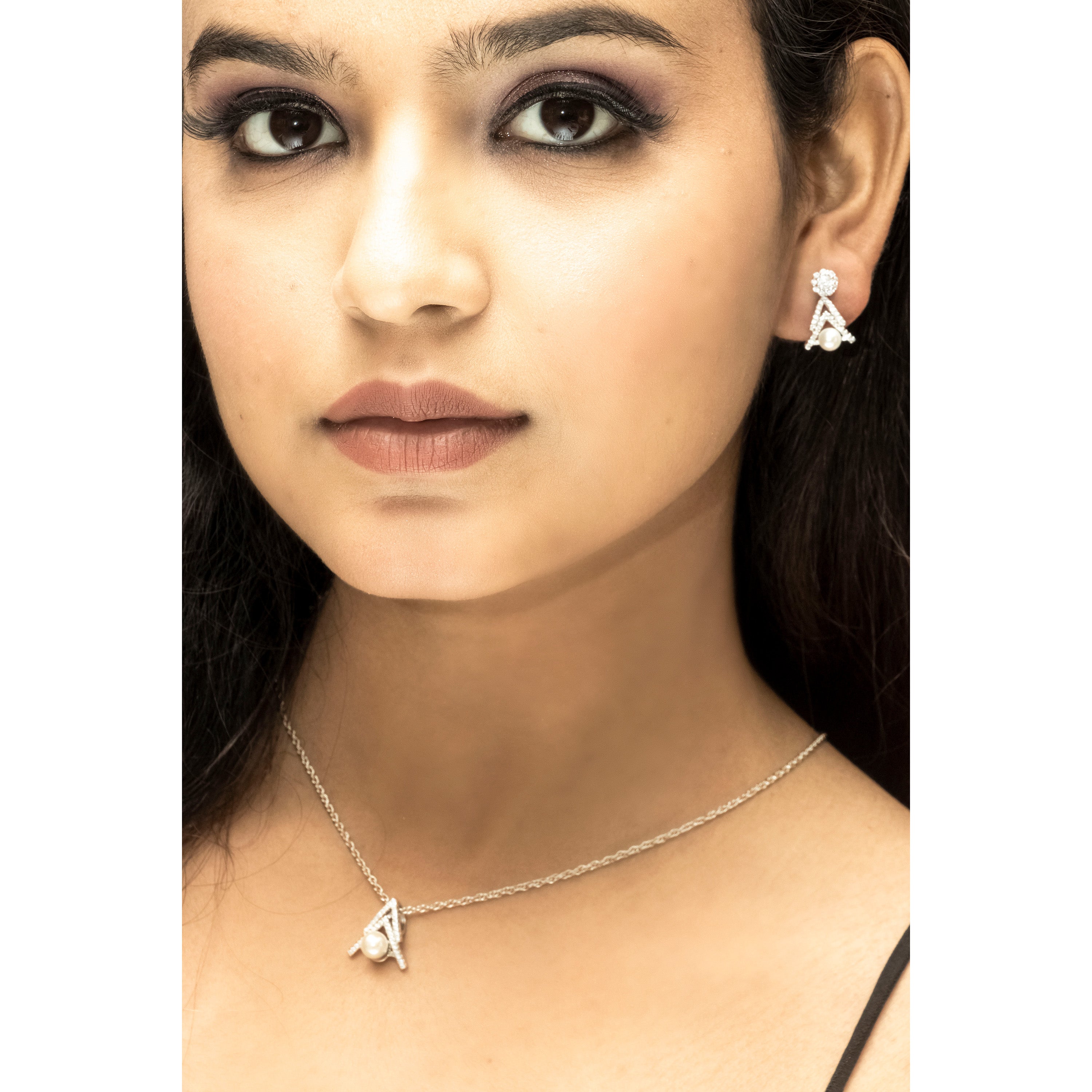 Elegance in Silver: Pearl and Diamond Pendant Set